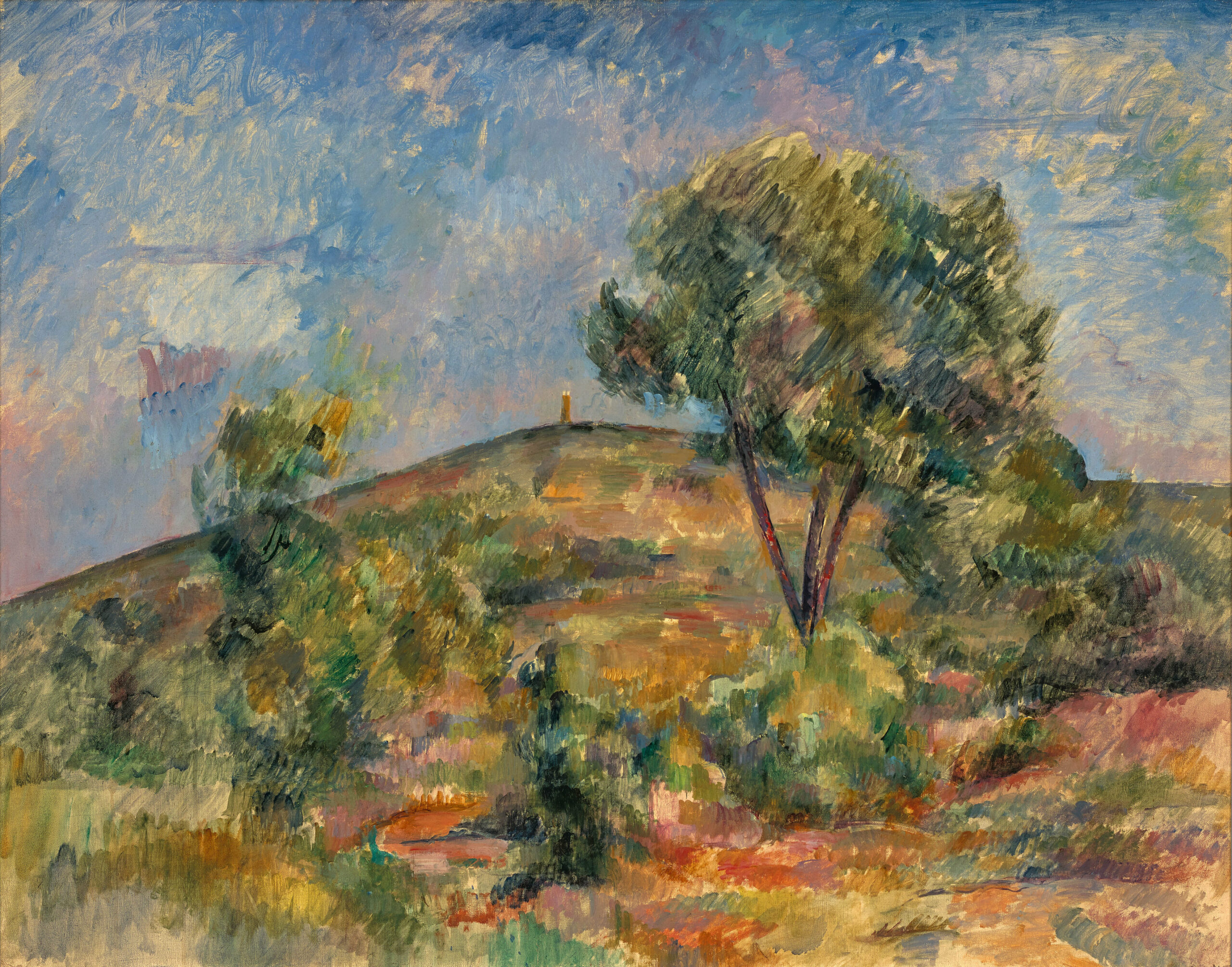 Colline aixoise, un arbre au premier plan et une tour maçonnée à l'arrière plan